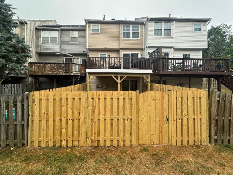 Pressure treated wooden fence townhome- City Light Construction LLC