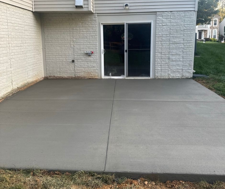 broom finis h concrete patio near Stafford- City Light Construction LLC