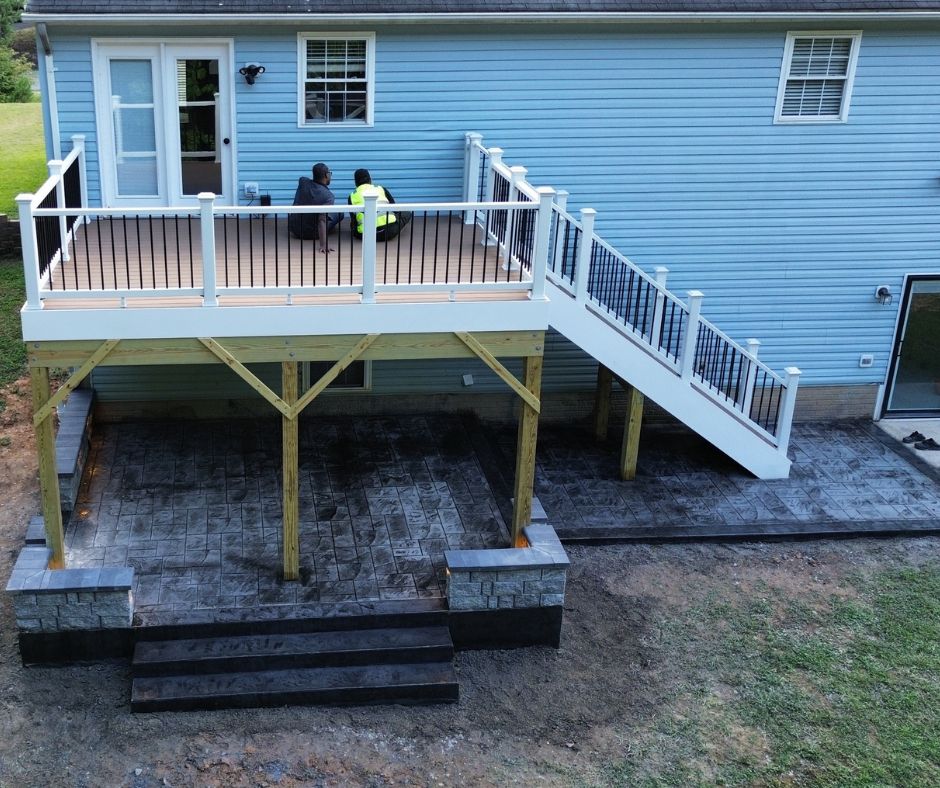 composite deck and stamped concrete patio City Light Construction LLC